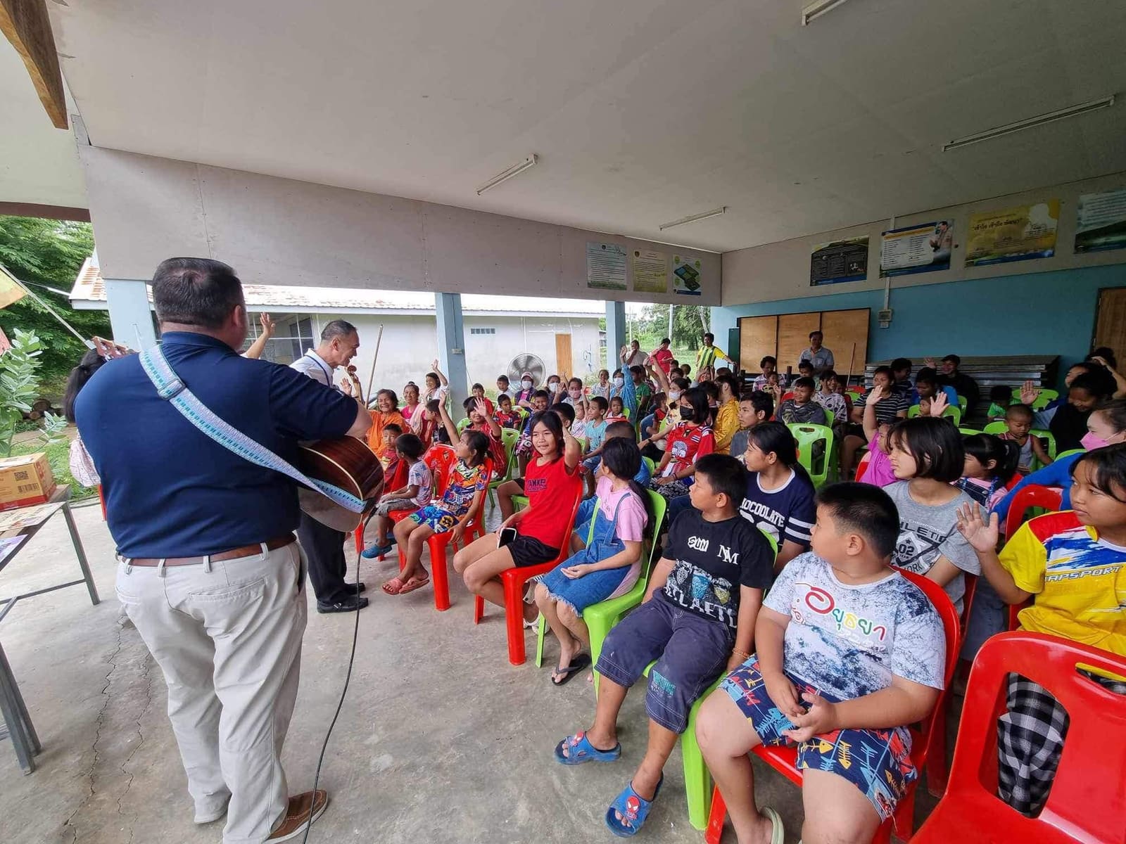 Children singing together at a ministry outreach